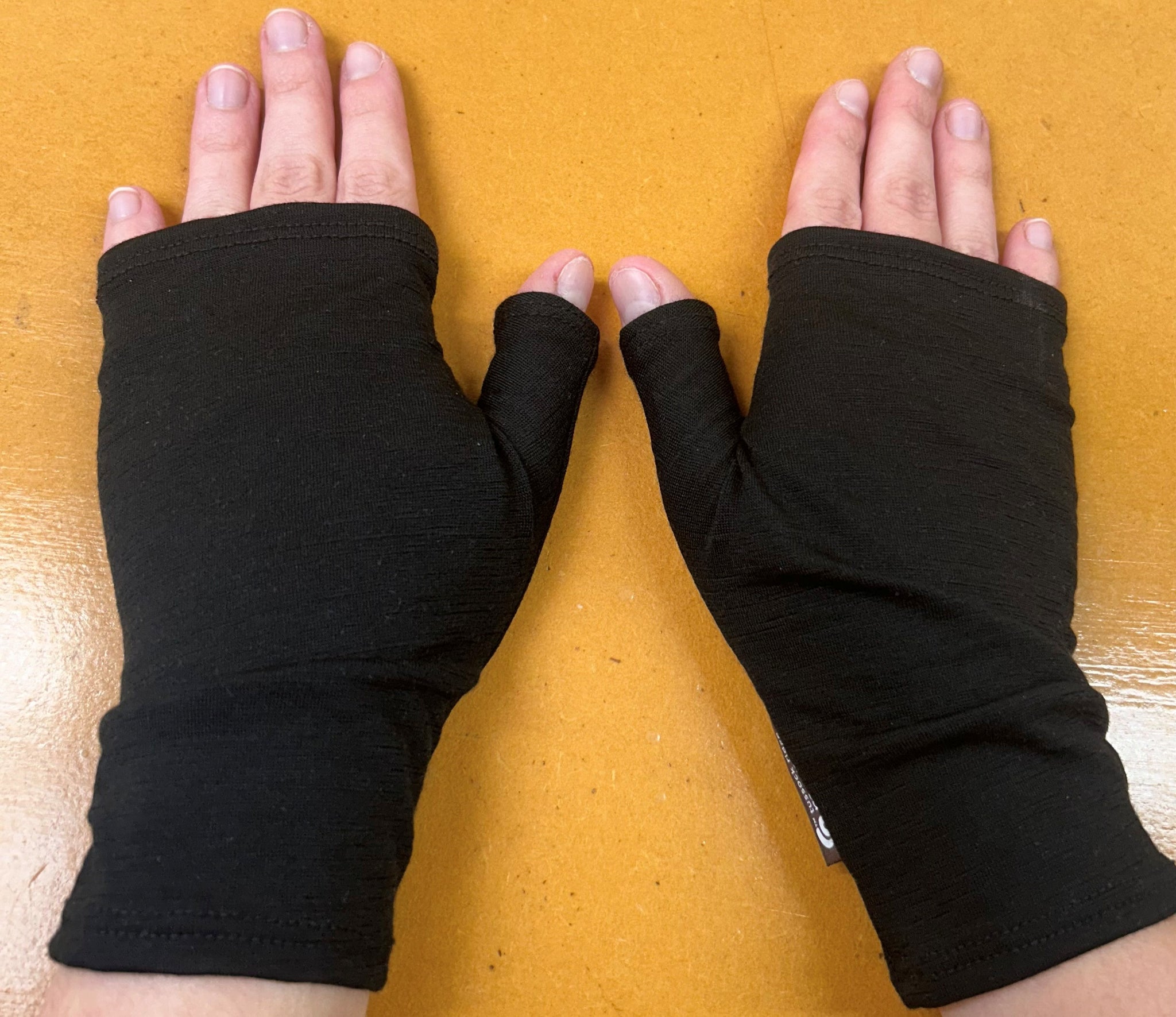 Limited Edition Black Fingerless Gloves. Made in New Zealand.